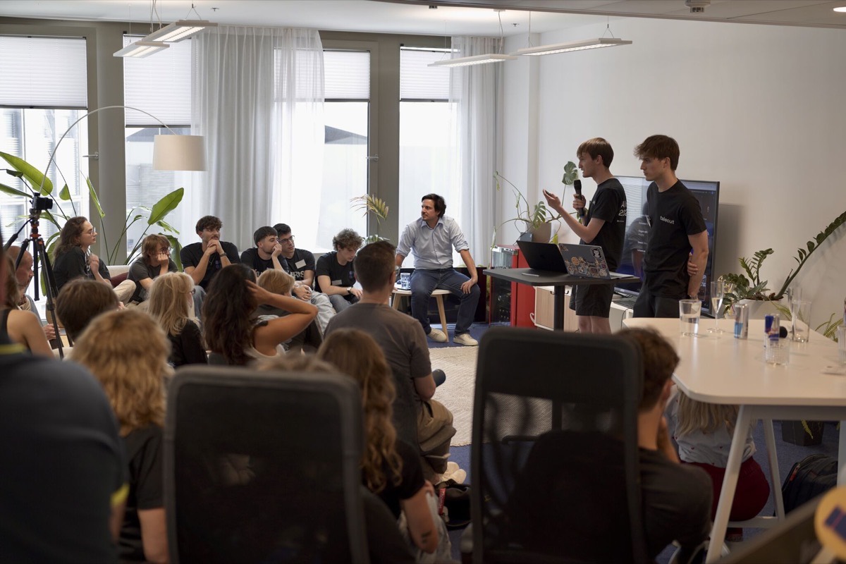 Two Talecut team members presenting to the room on Demo Day.